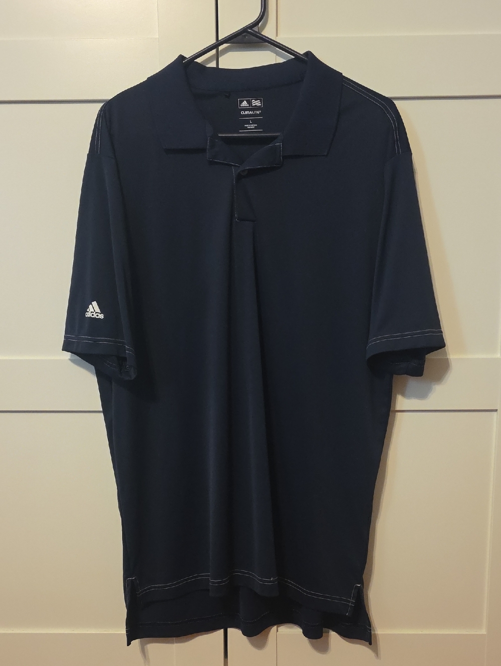 Adidas Climalite golf polo shirt in navy blue with contrast stitching